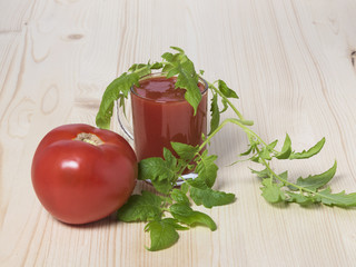 Red tomato and tomato juice