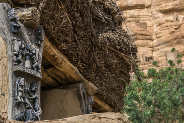 Ancient Dogon village built into the cliff face of the Bandiagara Escarpment in Mali