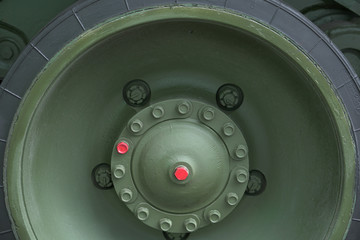 Elements of the running gear of a military vehicle. Background. Close-up