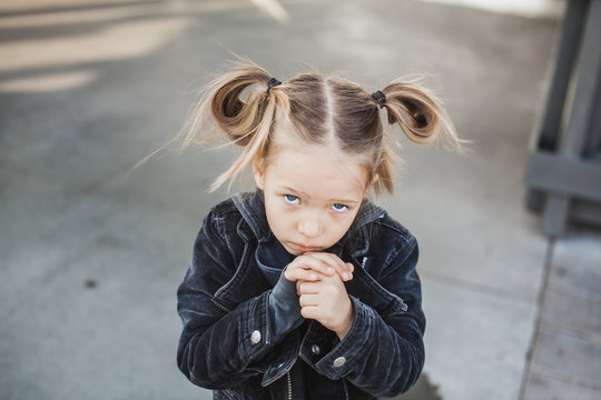 Cute little girl with pigtails