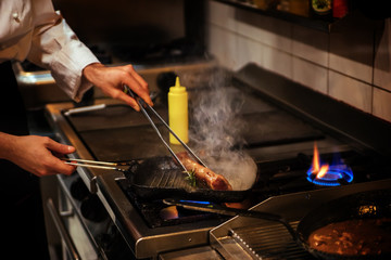 Chef In Restaurant Kitchen
