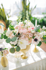 wedding decorated flowers in a vase in bright interior
