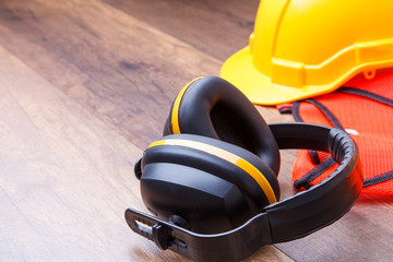 Ear protection hard had construction and reflective shirt concept of keeping of hearing
