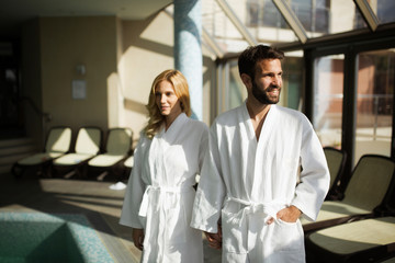 Portrait of attractive couple in spa center