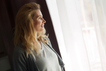 Portrait of beautiful woman standing in room