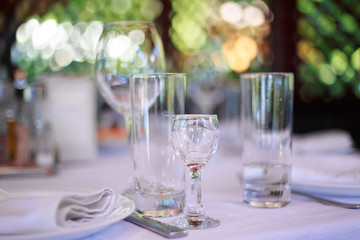 Sparkling glassware on table prepared for banquet