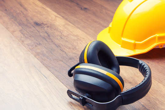 Ear Protection And Hard Hat Contruction Concept Of Keeping The Quality Of Hearing.