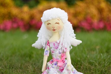 Hand sewing doll.