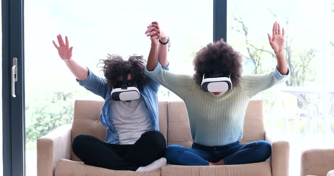 Couple Using Vr Glasses at home