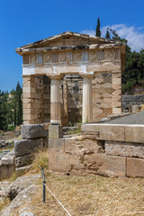 Fototapeta na wymiar Treasury of Athens in Ancient Greek archaeological site of Delphi, Central Greece
