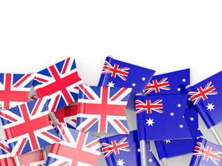 Flag pins of United Kingdom and Australia isolated on white