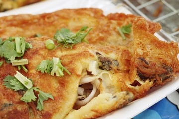 Crispy fried mussels with egg