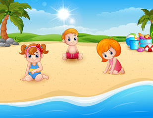 Obraz na płótnie Canvas Children playing at the beach 