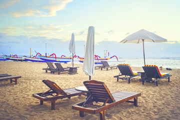 Stunning beautiful beach with relaxing scenery on a beach. Famous travel destination in Sanur, Bali, Indonesia.