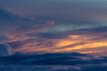 Colorful dramatic sky with cloud at sunset.Sky with sun background