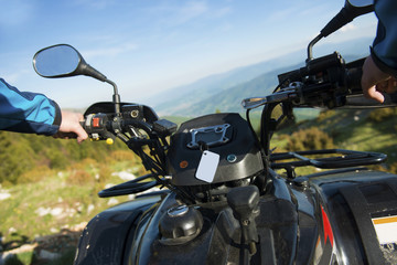 Young man on quad bike on a countryside trail. View from a quad bike. © FS-Stock