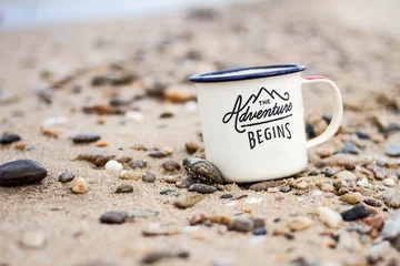 Printed kitchen splashbacks Camps Bay Beach, Cape Town, South Africa Enameled tourist mug on the sandy beach of Lake Baikal among the stones in the summer.