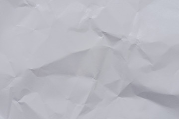 Fototapeta premium White crumpled paper background and texture, Wrinkled creased paper white abstract