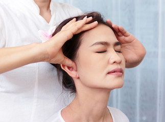 Fototapeta premium Close up of Thai massage face stretching, Spa Concept