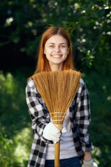 Young woman working in the garden, gardener