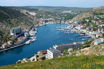 Fototapeta na wymiar Hidden sea bay of Balaclava town in Crimea