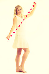 Girl with little red hearts.