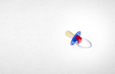 baby dummy or baby dummy silicone on a background.