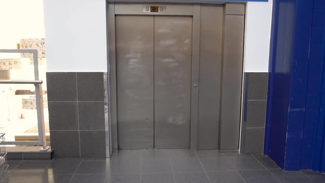 Elevator is arriving and doors open automatically