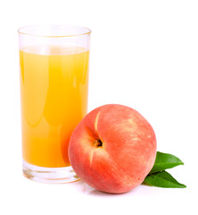 Glass of fruit juice and cut peaches isolated on white background