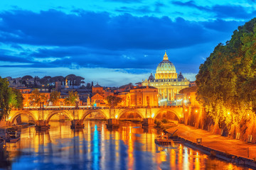 Fototapeta na wymiar View on Bridge Vittorio Emanuele II (Ponte Vittorio Emanuele II) and Vatican city St. Peter's Basilica (Basilica di San Pietro) at night time. Rome. Italy.
