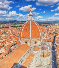 Fototapeta na wymiar Above view Santa Maria del Fiore (Cattedrale di Santa Maria del Fiore) in Florence, most famous of the architectural edifice of the Florentine Quattrocento. Italy.