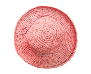 Fototapeta na wymiar Red pretty straw hat with bow on white background. Beach hat top view isolated