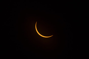 Obraz na płótnie Canvas Partial phase of the 2017 solar eclipse in Grand Teton National Park, WY.