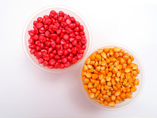 Corn seeds coating with red color