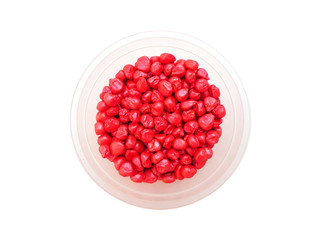 Corn seeds coating with red color