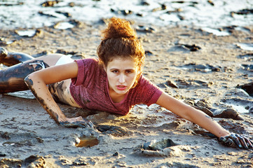 Beautiful young women go out and have fun dirty mud . Girls at the Spa