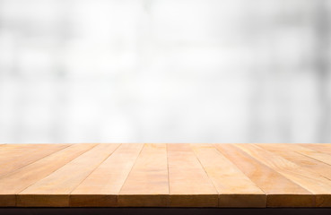 Wood table top on blur white abstract background.For montage product display or  key visual layout background.