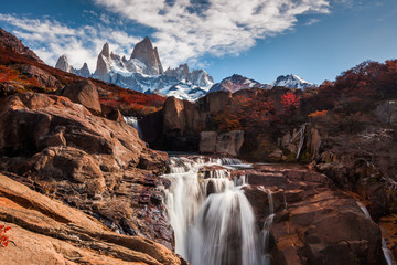 Beautiful view with waterfall and Fitz Roy mountain. Patagonia, Argentina - obrazy, fototapety, plakaty