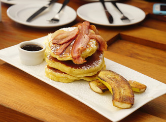 Grilled bacon on the layer of pancake