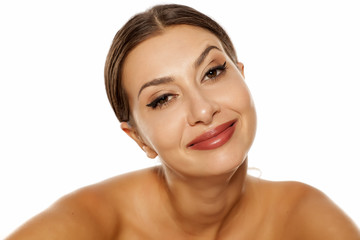 Obraz premium carefree young woman with a satisfied expression