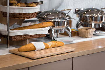 Fresh bread in wicker baskets in the hotel's buffet