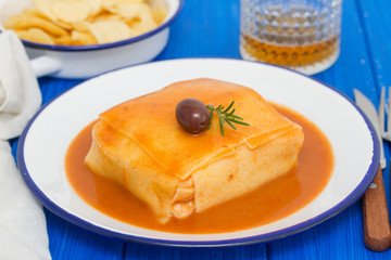 tradirional portuguese dish francesinha on dish