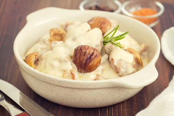 turkey with chestnut and boiled rice on dish