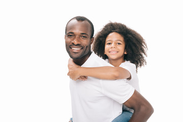 Obraz premium african american father carrying daughter