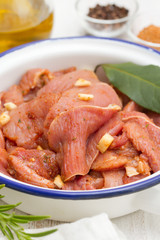 marinated turkey in white dish