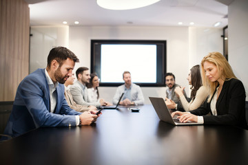 Perspective businesspeople having meeting in conference room