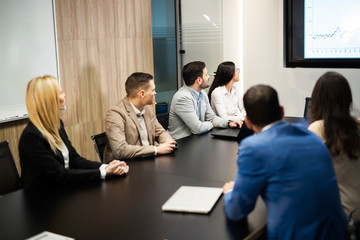 Perspective businesspeople having meeting in conference room