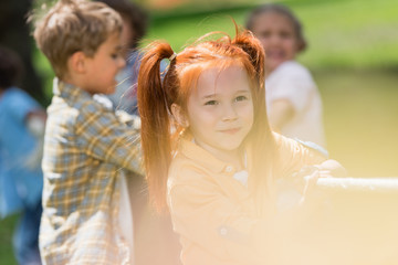children playing tug of war