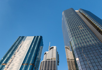 Fototapeta na wymiar modern skyscrapers in Brisbane CBD against blue sky with copy space