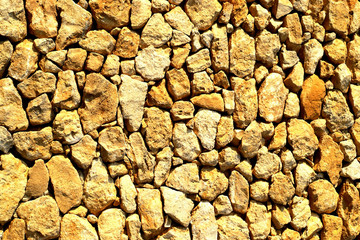 Yellow brown vintage textured stone brick wall background texture for design banner Wallpaper